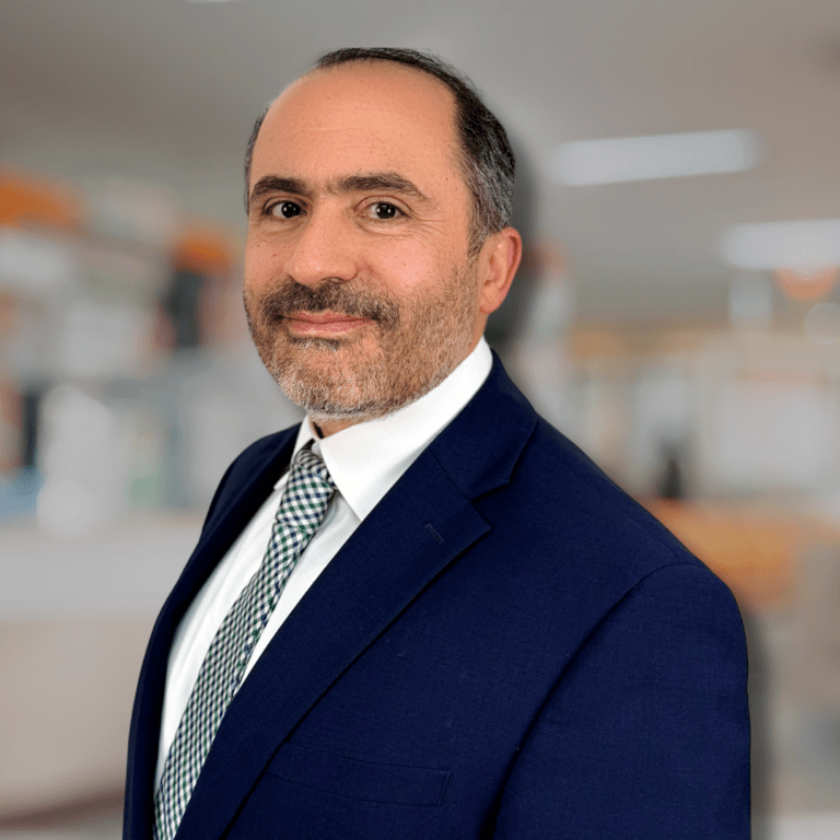 Charlie Berokhim, East Coast Capital team member, professional headshot showcasing real estate and investment expertise.
