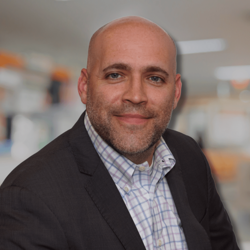 John Cain, East Coast Capital team member, professional headshot highlighting real estate and investment expertise