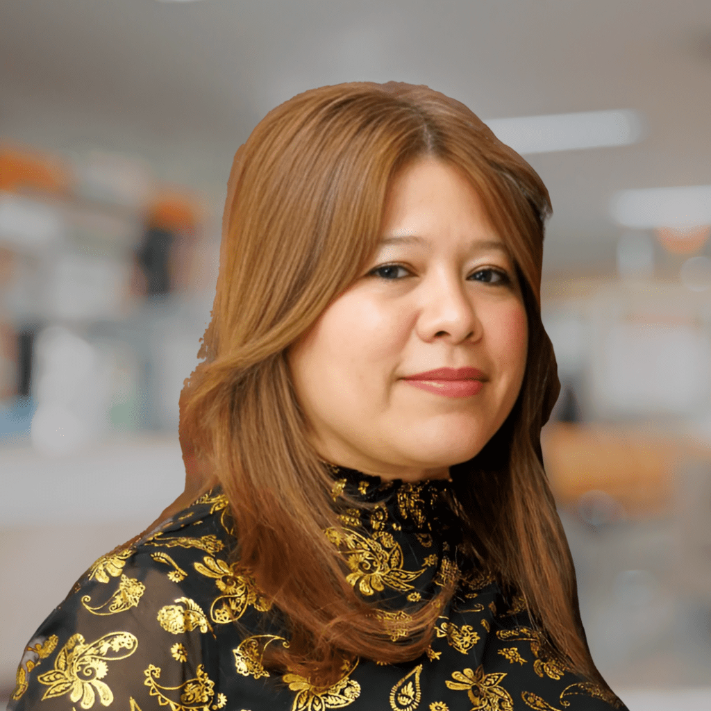 Helen Taveras, East Coast Capital team member, professional headshot highlighting real estate and investment expertise.