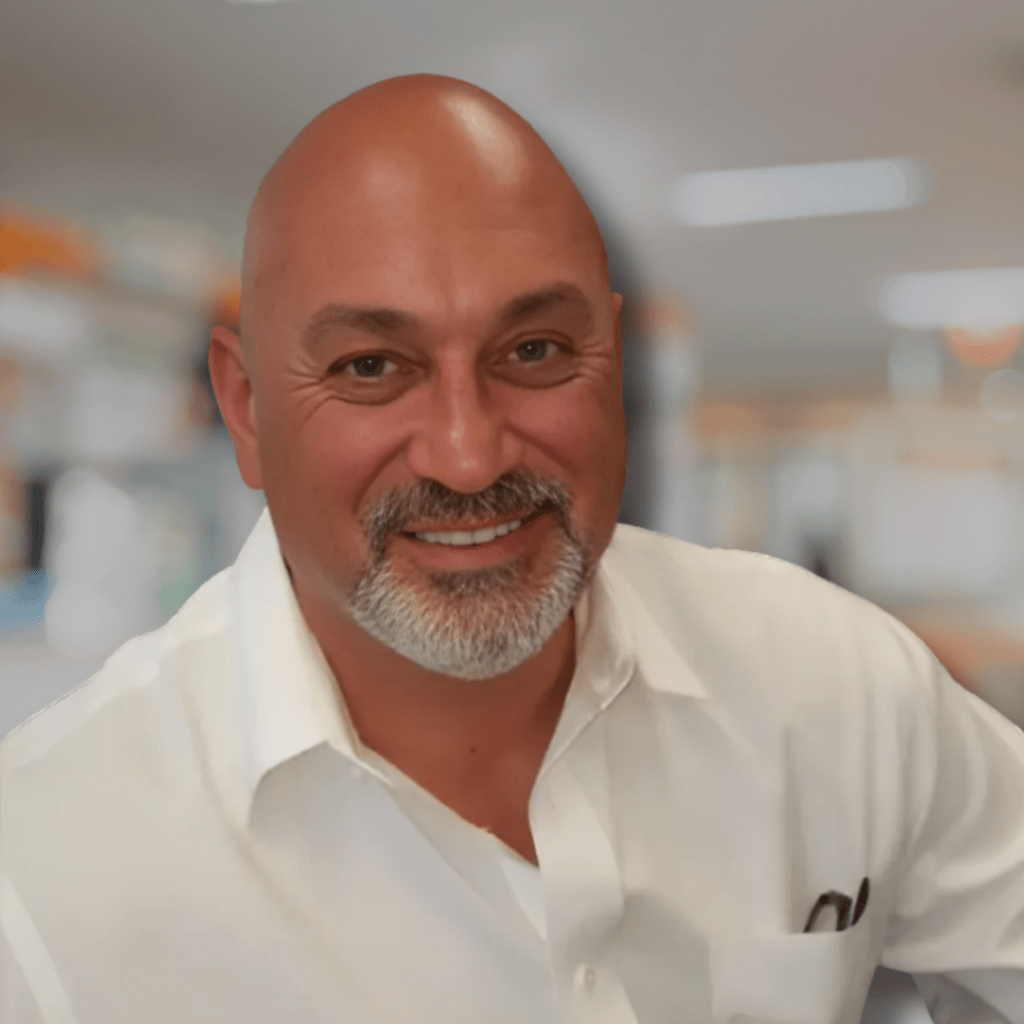 Paul Sabo, East Coast Capital team member, professional headshot showcasing real estate and investment expertise.